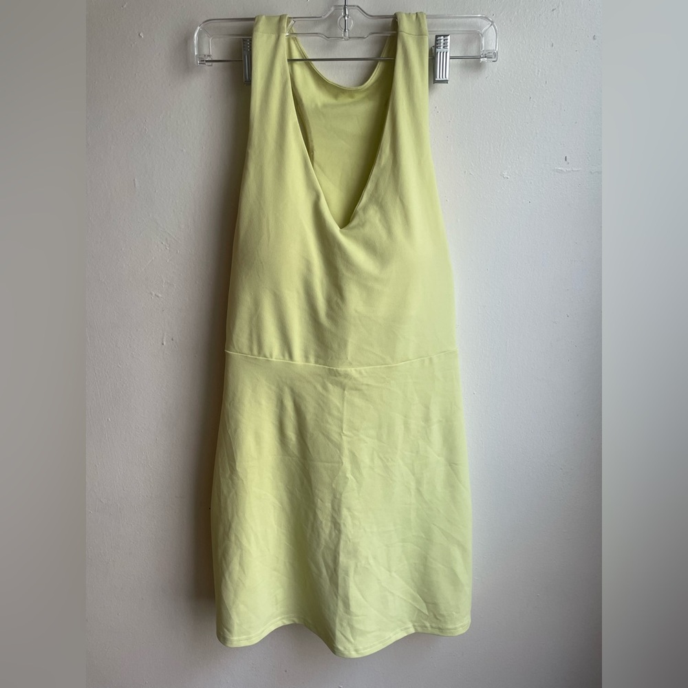 Fabletics light neon yellow tennis dress. Built in bra.